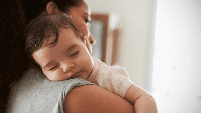 Why does your baby stop crying when you stand up holding them?